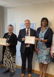 Dr Rum Thomas and Dr Shirley Spoors celebrating their completion of the programme with members of the Board of Directors at DBTH